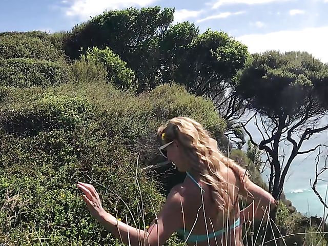 Mountain hiker Cherie DeVille wearing denim shorts