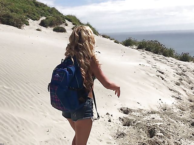 Mountain hiker Cherie DeVille wearing denim shorts