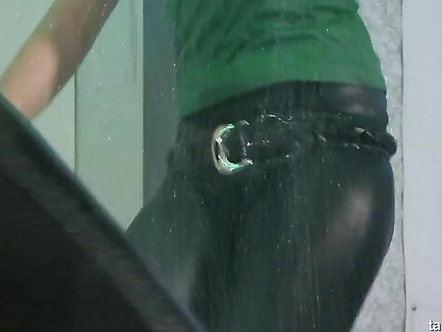 Clothed ladies get wet and strip nude in the club