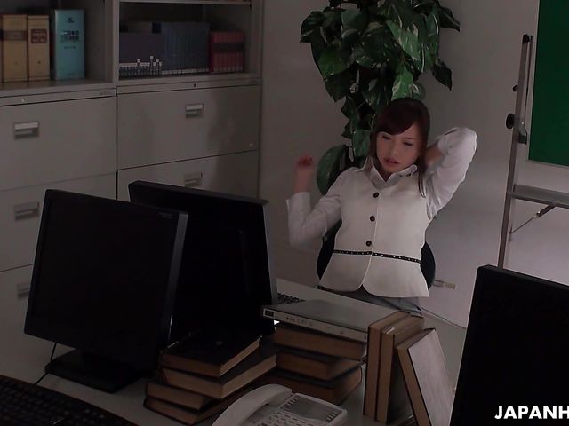 Office worker getting some juice up as her work gets boring