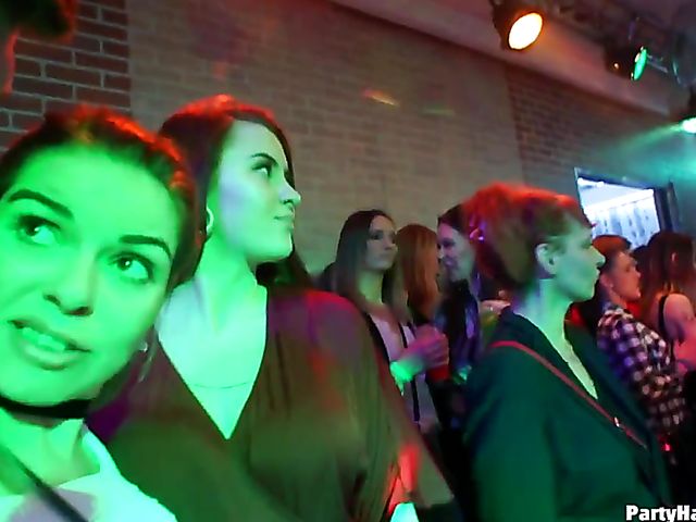 Party blowjob in the crowd in a nightclub