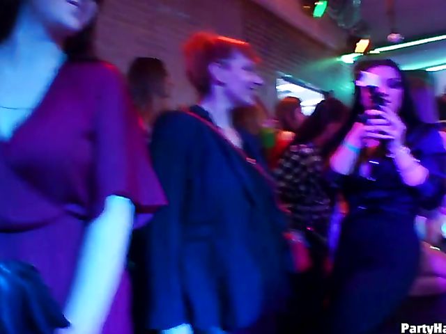 Party blowjob in the crowd in a nightclub