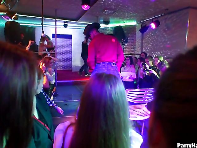 Party blowjob in the crowd in a nightclub