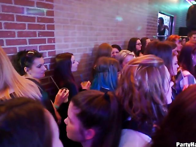 Party blowjob in the crowd in a nightclub