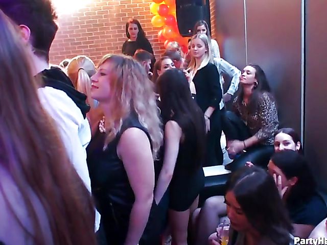 Party blowjob in the crowd in a nightclub