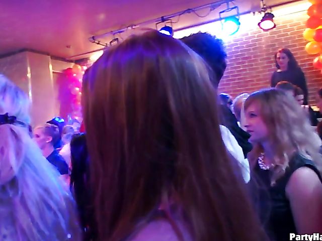 Party blowjob in the crowd in a nightclub