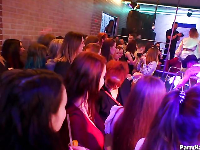 Party blowjob in the crowd in a nightclub