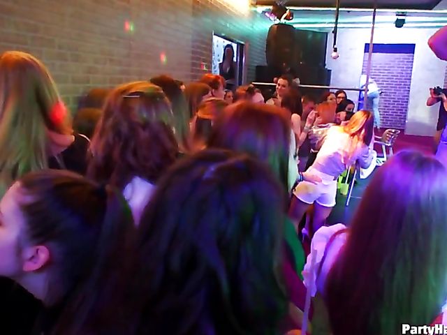 Party blowjob in the crowd in a nightclub