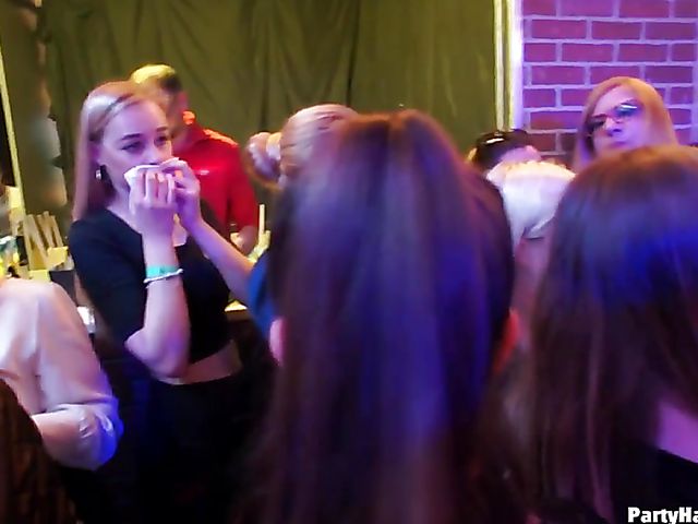 Party blowjob in the crowd in a nightclub