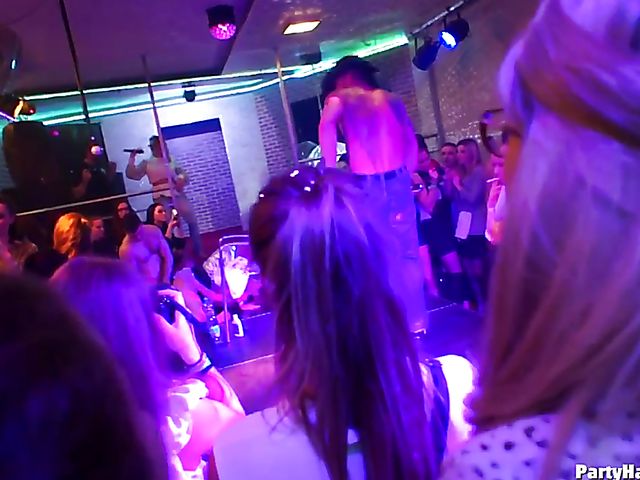 Party blowjob in the crowd in a nightclub