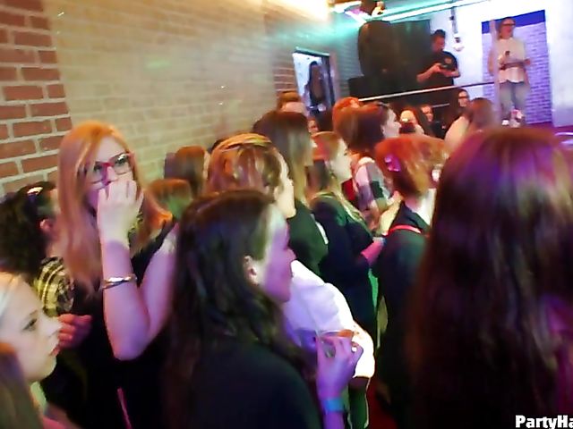 Party blowjob in the crowd in a nightclub