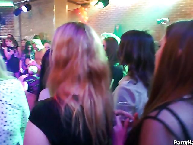 Party blowjob in the crowd in a nightclub