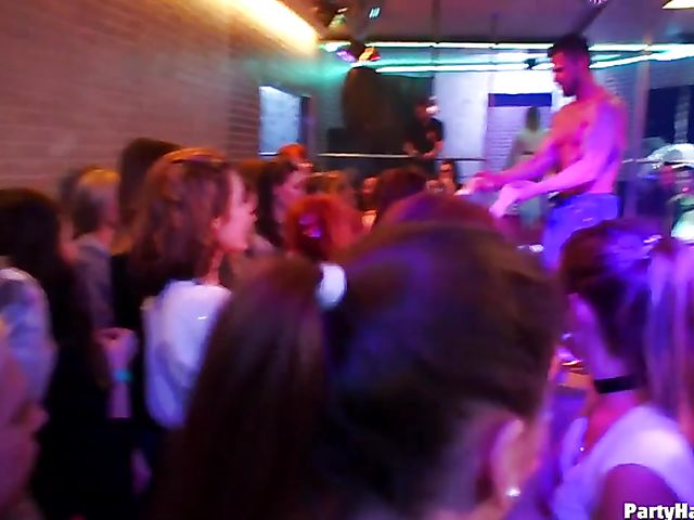 Party blowjob in the crowd in a nightclub