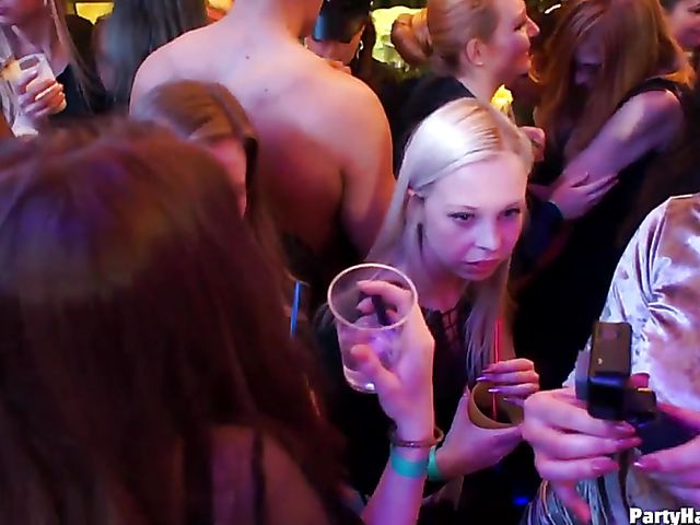 Party blowjob in the crowd in a nightclub