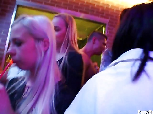Party blowjob in the crowd in a nightclub