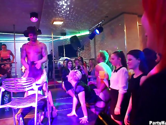 Party blowjob in the crowd in a nightclub