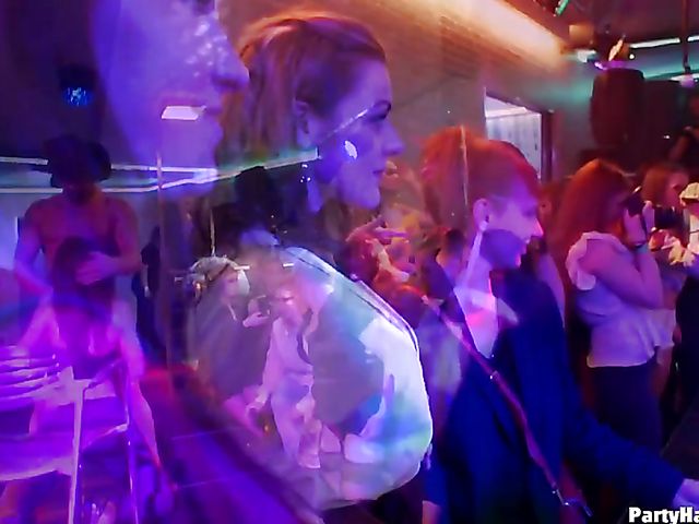 Party blowjob in the crowd in a nightclub