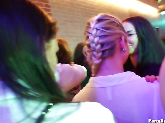 Party blowjob in the crowd in a nightclub