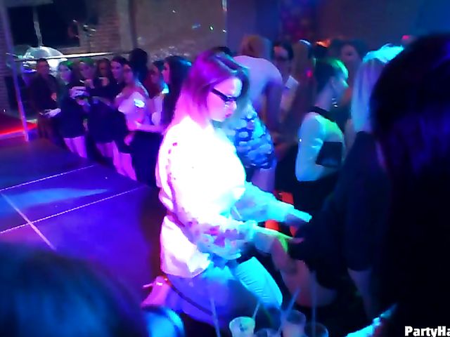 Party blowjob in the crowd in a nightclub