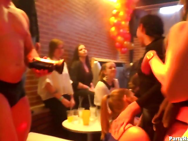 Male strippers play with dirty babes in the club