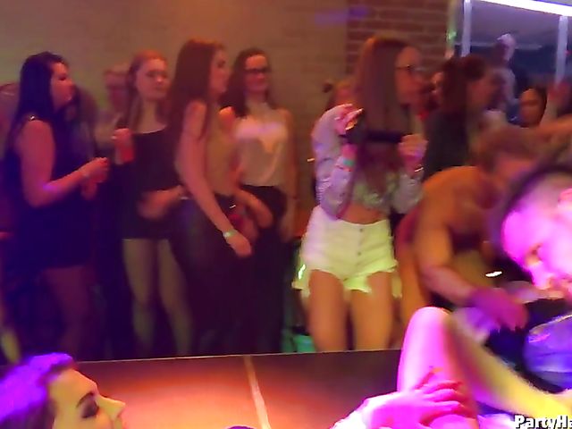 Male strippers play with dirty babes in the club