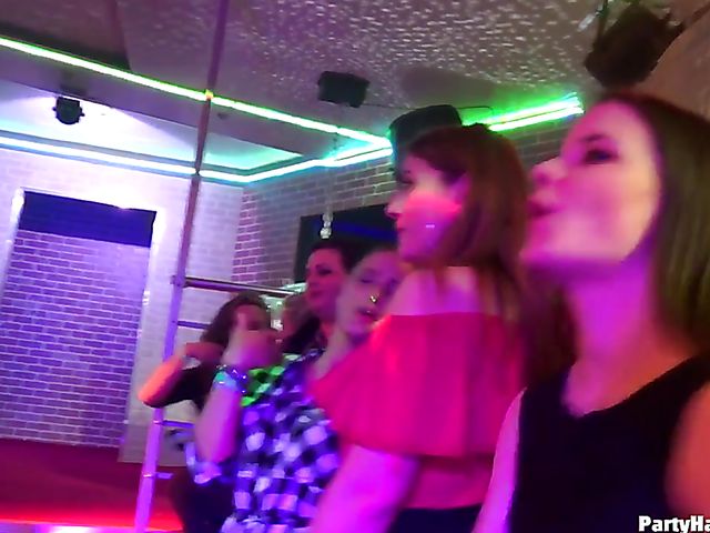 Male strippers play with dirty babes in the club