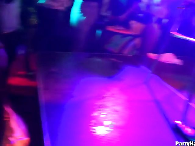 Male strippers play with dirty babes in the club