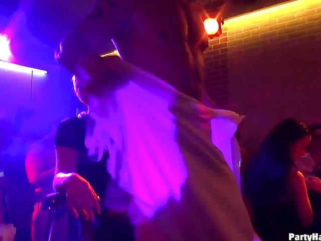 Male strippers play with dirty babes in the club