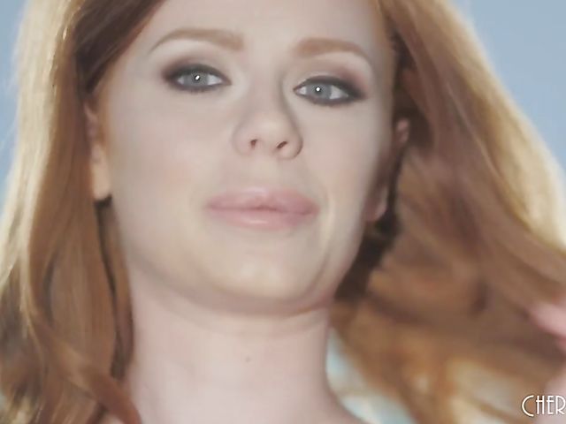 British redhead Ella Hughes plays with her slit