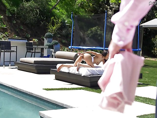 Teen Maya Bijou replaces a dildo with a fat cock by the pool