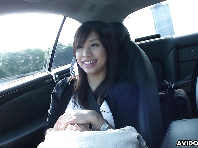 Japanese sweetie Karin Asahi gives a car blowjob 