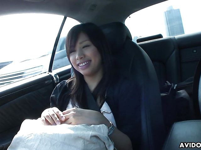 Japanese sweetie Karin Asahi gives a car blowjob 