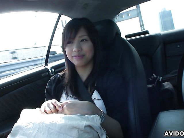Japanese sweetie Karin Asahi gives a car blowjob 