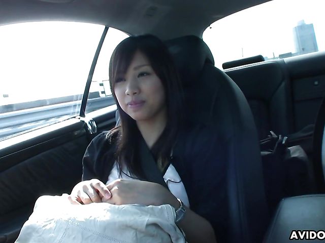 Japanese sweetie Karin Asahi gives a car blowjob 