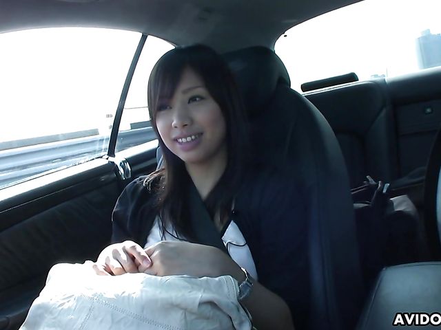 Japanese sweetie Karin Asahi gives a car blowjob 