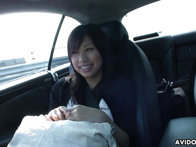 Japanese sweetie Karin Asahi gives a car blowjob 