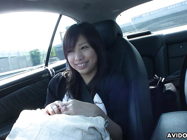 Japanese sweetie Karin Asahi gives a car blowjob 