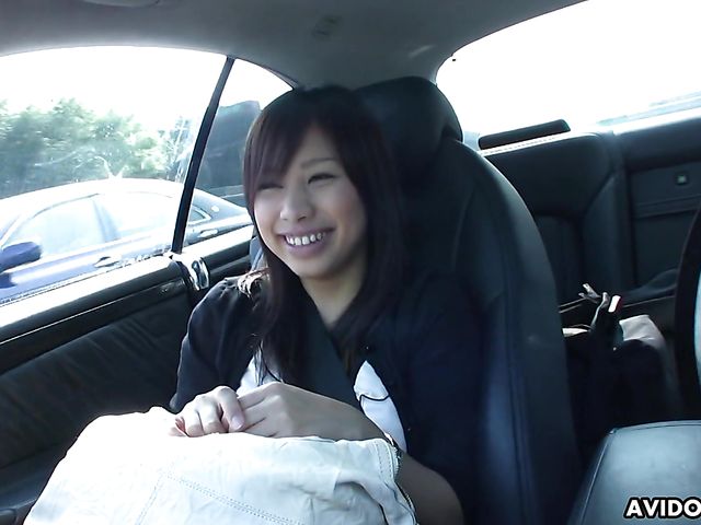 Japanese sweetie Karin Asahi gives a car blowjob 
