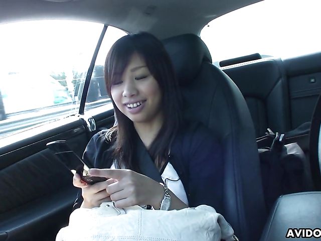 Japanese sweetie Karin Asahi gives a car blowjob 