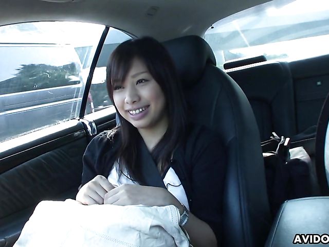 Japanese sweetie Karin Asahi gives a car blowjob 