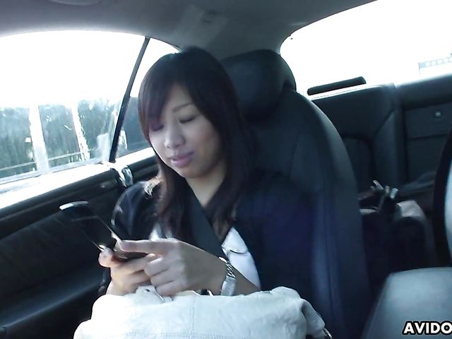 Japanese sweetie Karin Asahi gives a car blowjob 