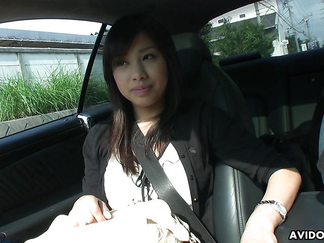 Japanese sweetie Karin Asahi gives a car blowjob 