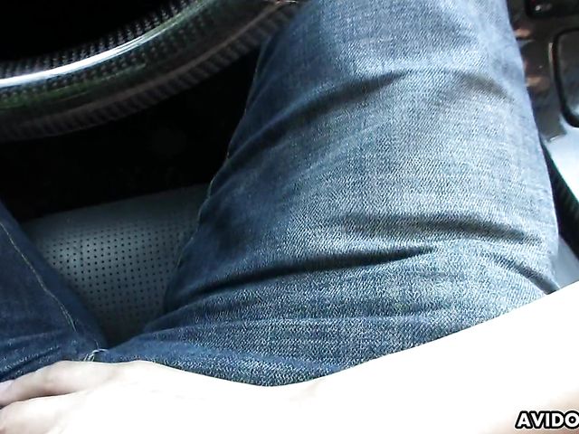 Japanese sweetie Karin Asahi gives a car blowjob 