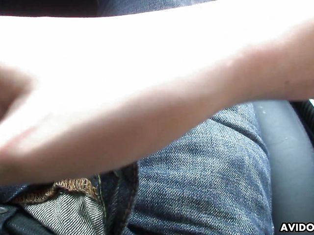 Japanese sweetie Karin Asahi gives a car blowjob 