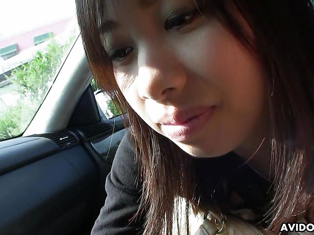 Japanese sweetie Karin Asahi gives a car blowjob 