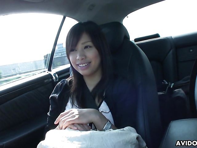Japanese sweetie Karin Asahi gives a car blowjob 