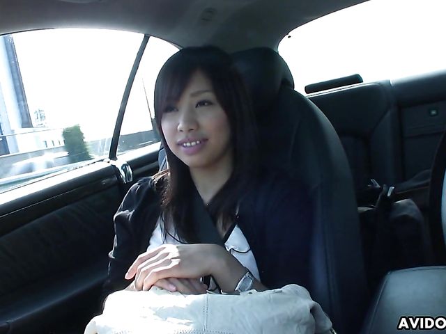 Japanese sweetie Karin Asahi gives a car blowjob 
