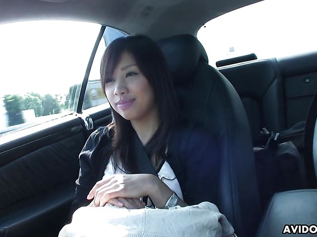 Japanese sweetie Karin Asahi gives a car blowjob 