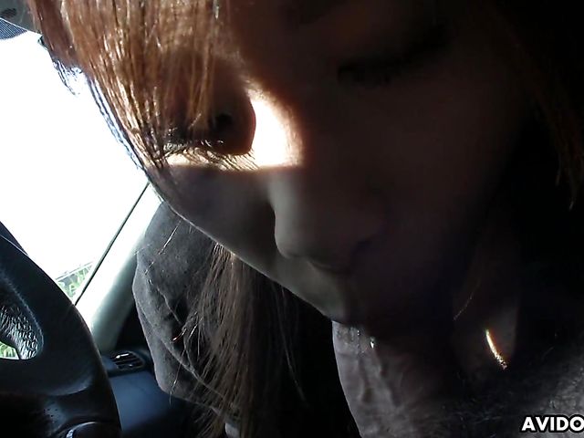 Japanese sweetie Karin Asahi gives a car blowjob 