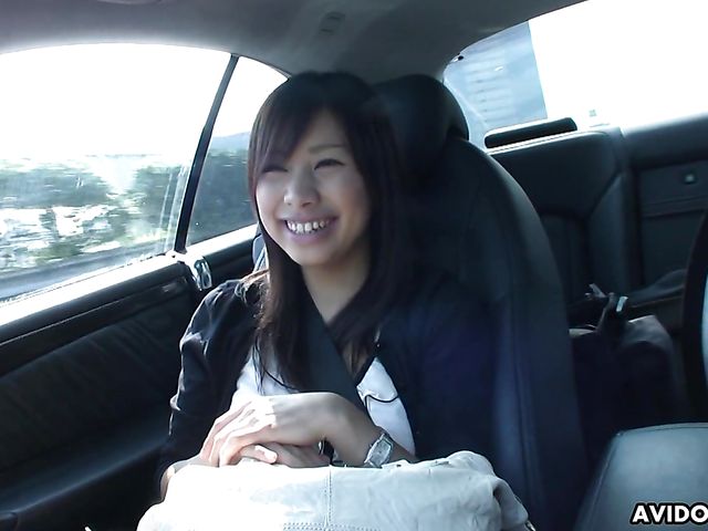 Japanese sweetie Karin Asahi gives a car blowjob 